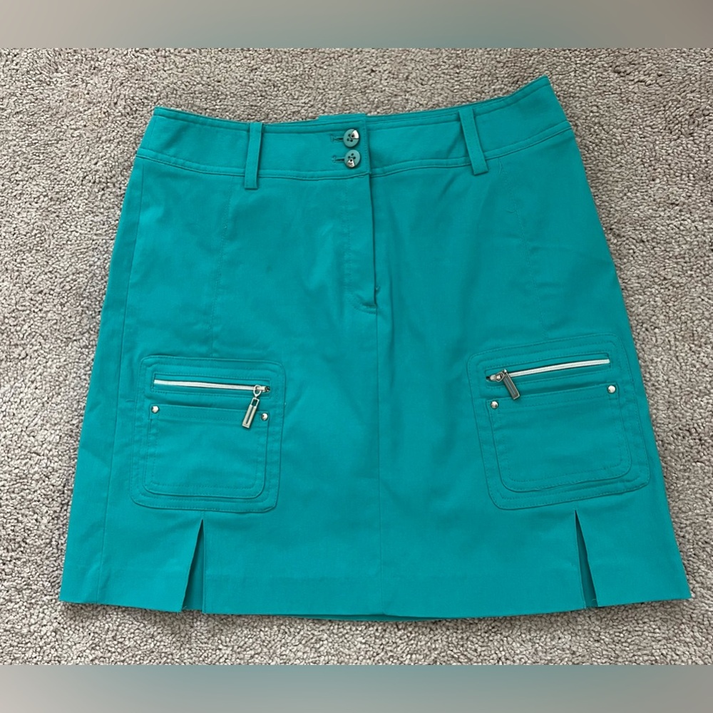 Jamie Sadock Ladies Golf Skort Skirt, Teal, Size 2. Six pockets, stylish accents